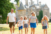 Family Outside Palace House