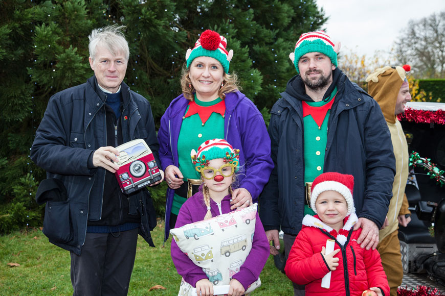 Lord Montagu with the Gorajek family, winners of best dressed family
