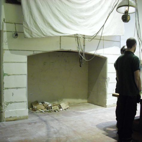 The fireplace behind the Kitchen Shop cupboard is revealed