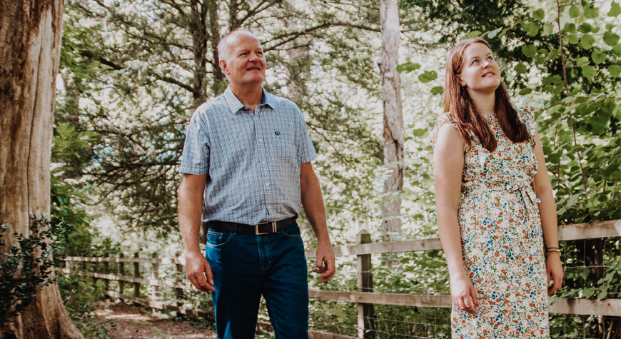Family walking through the Mill Pond Walk