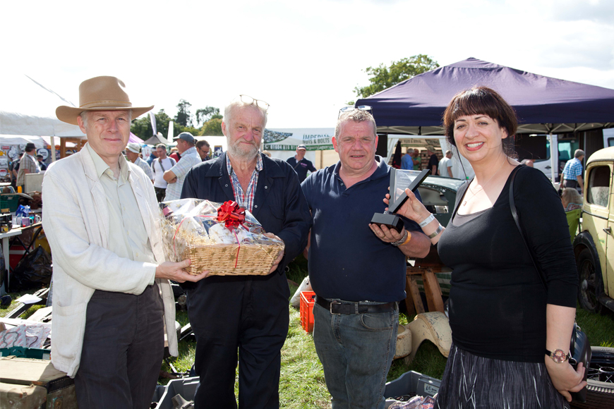 Lord Montagu and Lolly Lee present IAJ Best Stand award winners David Wilkinson and Mark Cocklin with trophy and Ringwood Brewery hamper