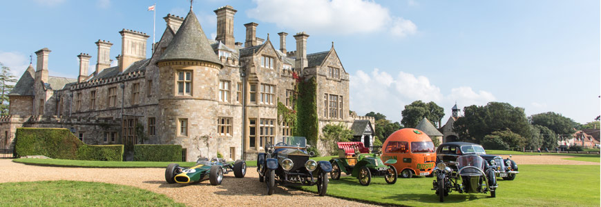 Historic vehicles from the National Motor Museum outside Palace House