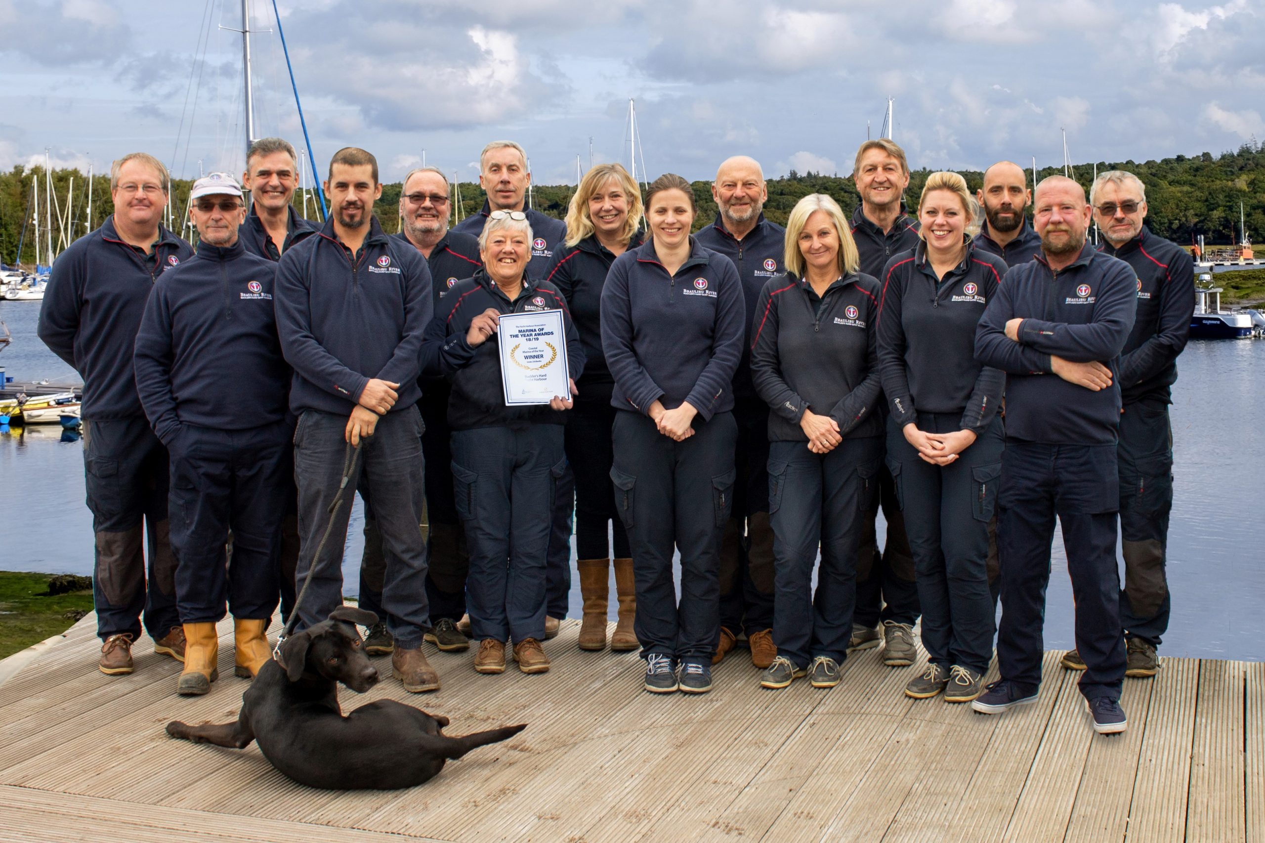 Buckler's Hard Yacht Harbour team with winner certificate