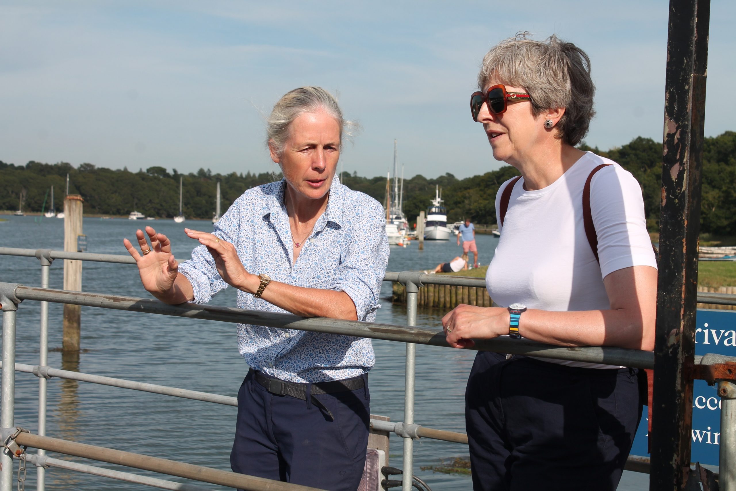 Mary Montagu-Scott with Theresa May overlook the Beaulieu River