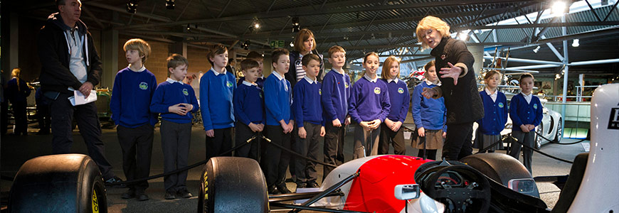 School group on an education visit in the National Motor Museum at Beaulieu
