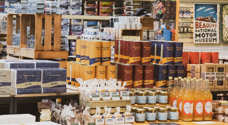 A display of Beaulieu branded fudge, biscuits and apple juice in the Beaulieu gift shop