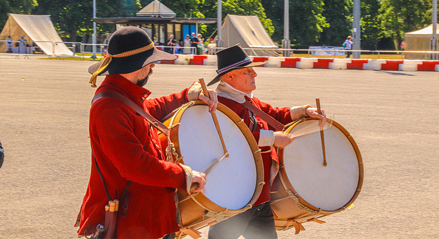 Re-enactors drumming in the Arena