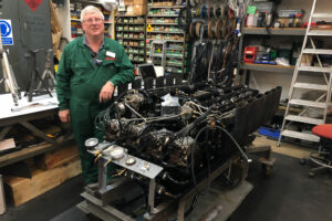National-Motor-Museum-Senior-Engineer-Ian-Stanfield-with-the-restored-Sunbeam-1000hp-engine