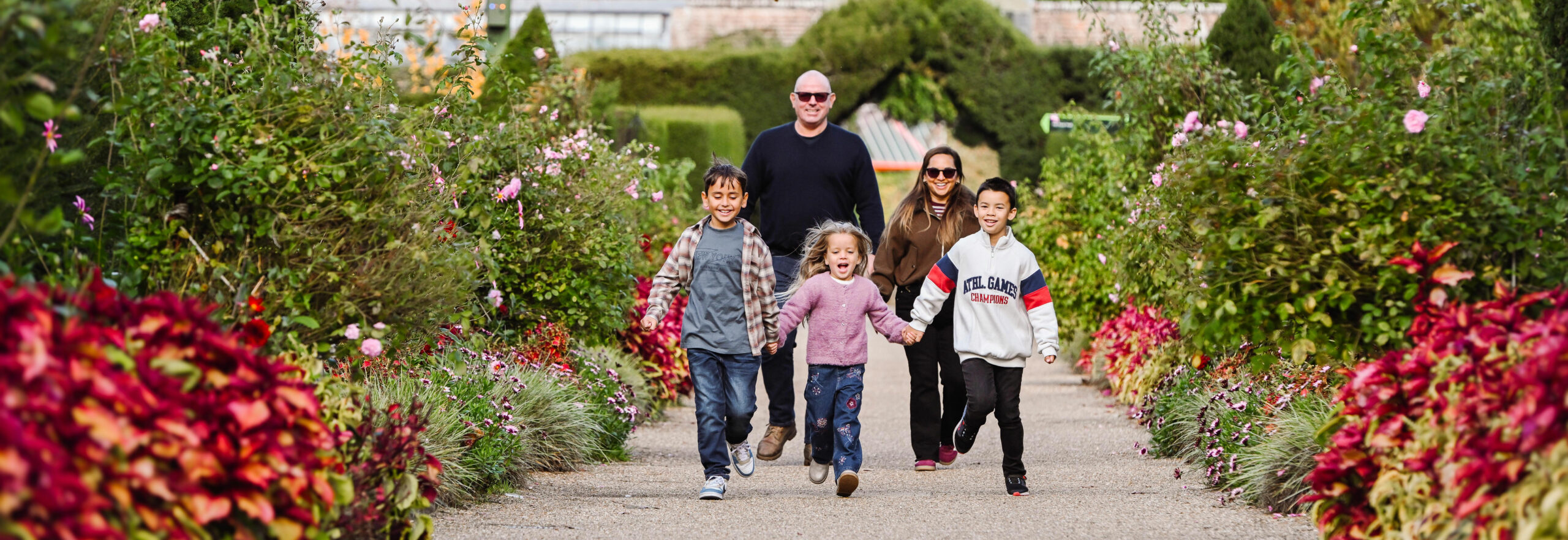 Family enjoy autumnal gardens at Beaulieu