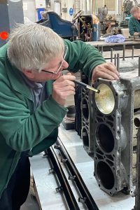 National-Motor-Museum-Senior-Engineer-Ian-Stanfield-inspects-cylinder-bores