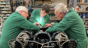 Senior Engineer Ian Stanfield (left), apprentice Aaron Burton and volunteer Phil Hibbard work on Sunbeam's second engine ready for testing