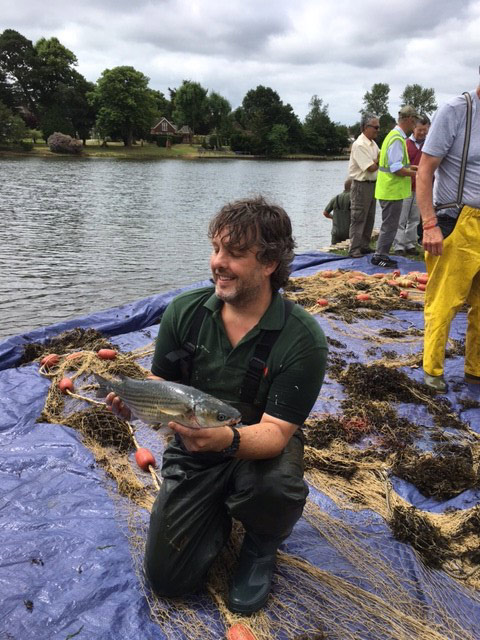 Steve shows off a grey mullet from the Beaulieu River