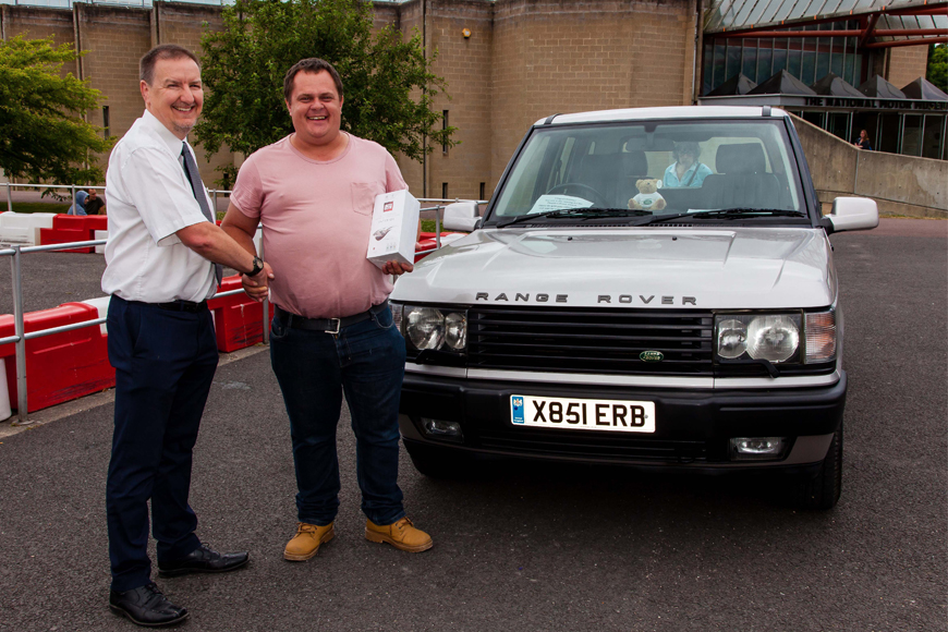 Simply Land Rover People's Choice Runner Up Michael Ridgley with Beaulieu Financial Director Phil Johnson
