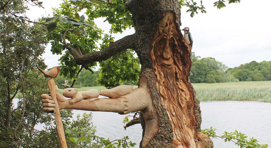 Green Man tree carving on the Mill Pond Walk