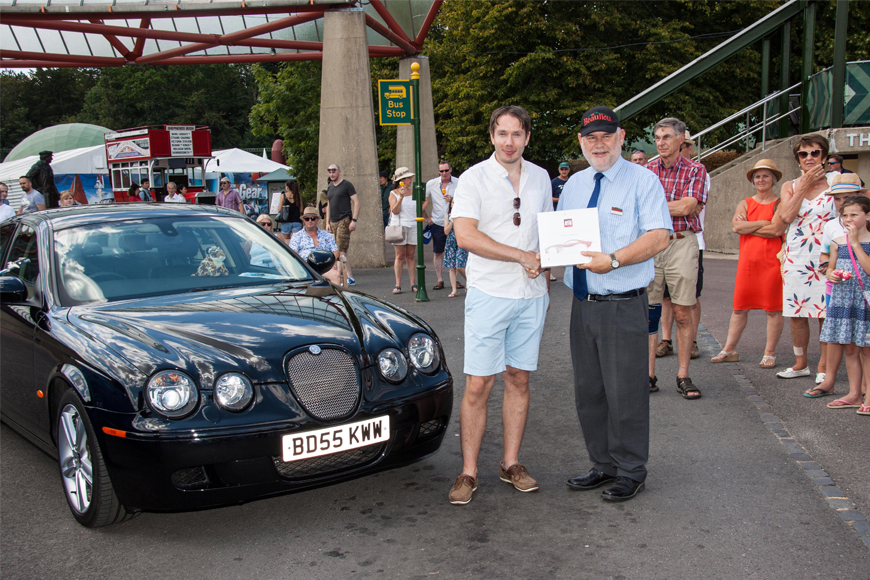 Simply Jaguar People's Choice runner-up Tom Moon is presented with prize by Beaulieu Managing Director Russel Bowman