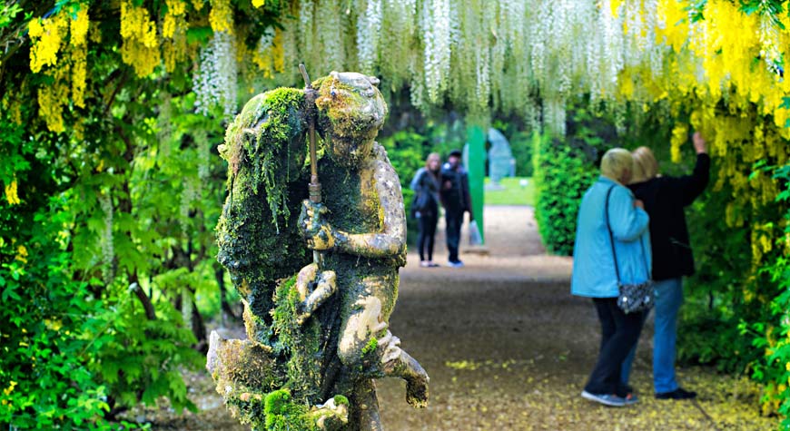 Wisteria and statue in the Beaulieu gardens